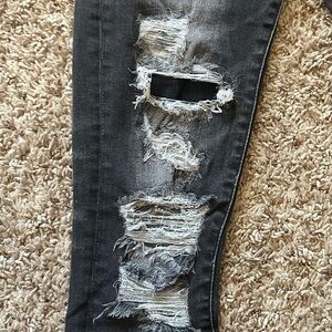 Buckle Black High Rise Skinny’s